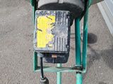 an image of a machine that is sitting on the ground