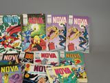 many comic books sitting on top of each other on a table