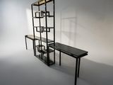 a black shelf with a glass shelf and a black table