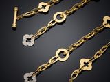 a collection of gold and diamond necklaces