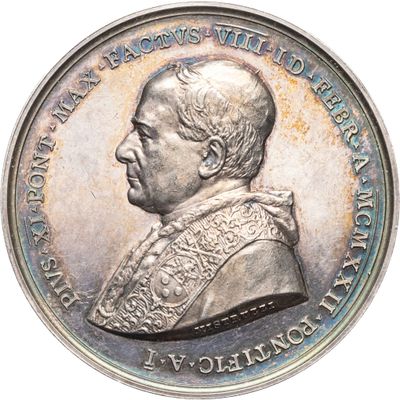 une image représentant une pièce d'argent sur laquelle figure le portrait d'un homme