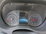 a close up of a car dashboard with a speedometer and gauges