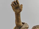 an image of a statue of an angel on a marble base