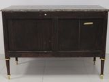 a wooden cabinet with a marble top on a tile floor