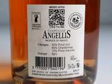 a label on a bottle of alcohol on a table