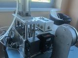 a machine that is sitting on a table in front of a window