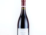 a bottle of wine that is sitting on a table