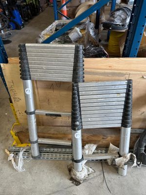 a pile of tools sitting on a pallet in a warehouse