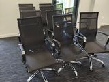 a lot of chairs that are in a room