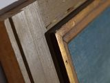 an image of a close up of a painting on a wall