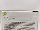 an apple iphone 5s box sitting on top of a white table