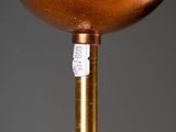 an image of a close up of a metal object on a pole