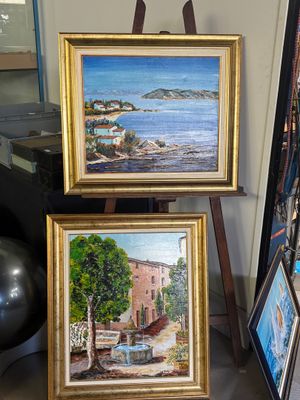 deux tableaux posés côte à côte sur un chevalet