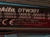 a close up of the back of a cordless driller