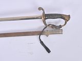 a sword that is laying on top of a table