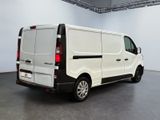 a white van that is parked in a room