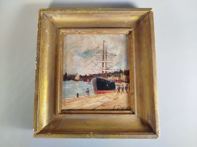 an oil painting of a ship in a gold frame on a white wall