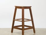 an image of a wooden stool sitting on top of a floor
