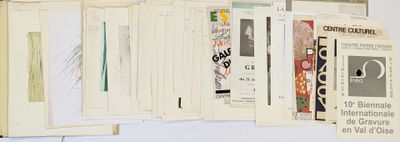 a lot of papers hanging on the wall next to each other