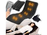 the woman is laying on the couch with the remote control in her hand