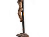an antique wooden crucifix with a wooden cross on it