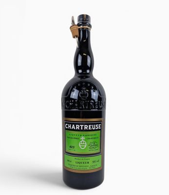 a bottle of chartreuse irish whiskey on a white background