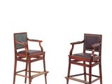 pair of mahogany and leather bar stools with arms