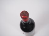 a bottle of wine with a cork stopper on it