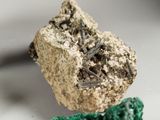 a piece of rock that has some kind of rock on top of it