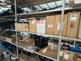 many boxes on the shelves in the garage