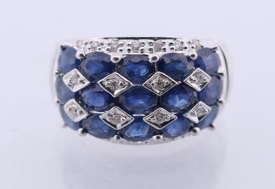 Bague Jonc en or or blanc 750°/.(18K) 6g ornée de Saphirs de…