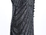 an image of a black and silver dress on a mannequin