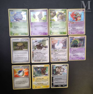 a lot of pokemon cards on the table