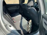 the back seat of a car with a bag in the back of it