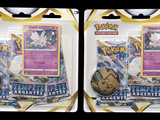 two packs of pokemon trading cards are shown on a black background