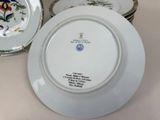 four plates that have different designs on them