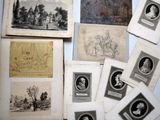 several old books with pictures of people on them sitting on a table