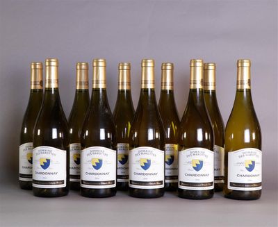 six bottles of white wine lined up in a row