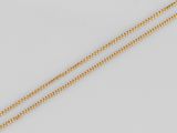 un collier composé d'une chaîne en or 18 carats et d'un pendentif en forme de cœur