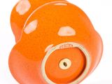 two oranges that are sitting next to each other