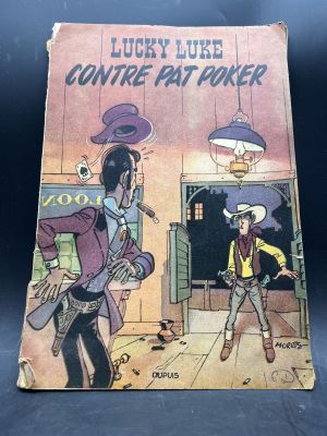 an old comic book with a cowboy and a cowboy in the background