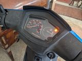 a close up of a motorcycle with a speedometer on it