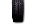 a close up of a tire on a white background