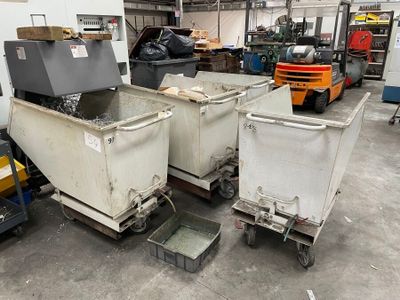 many bins that are sitting in a warehouse