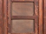 an old wooden picture frame with holes in it on a white background