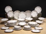 a lot of plates that are sitting on a table