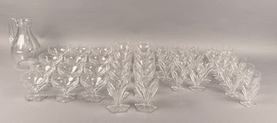 a lot of glass vases that are sitting on a table