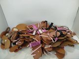 a pile of shoes that are sitting on the floor