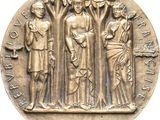 an image of a bronze medal depicting three men and a woman