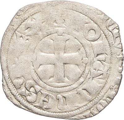 an old coin with a cross on it